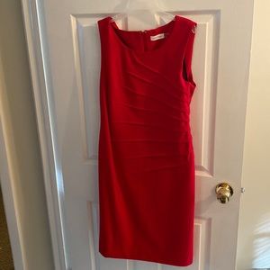 Woman’s red size 10 Calvin Klein dress.